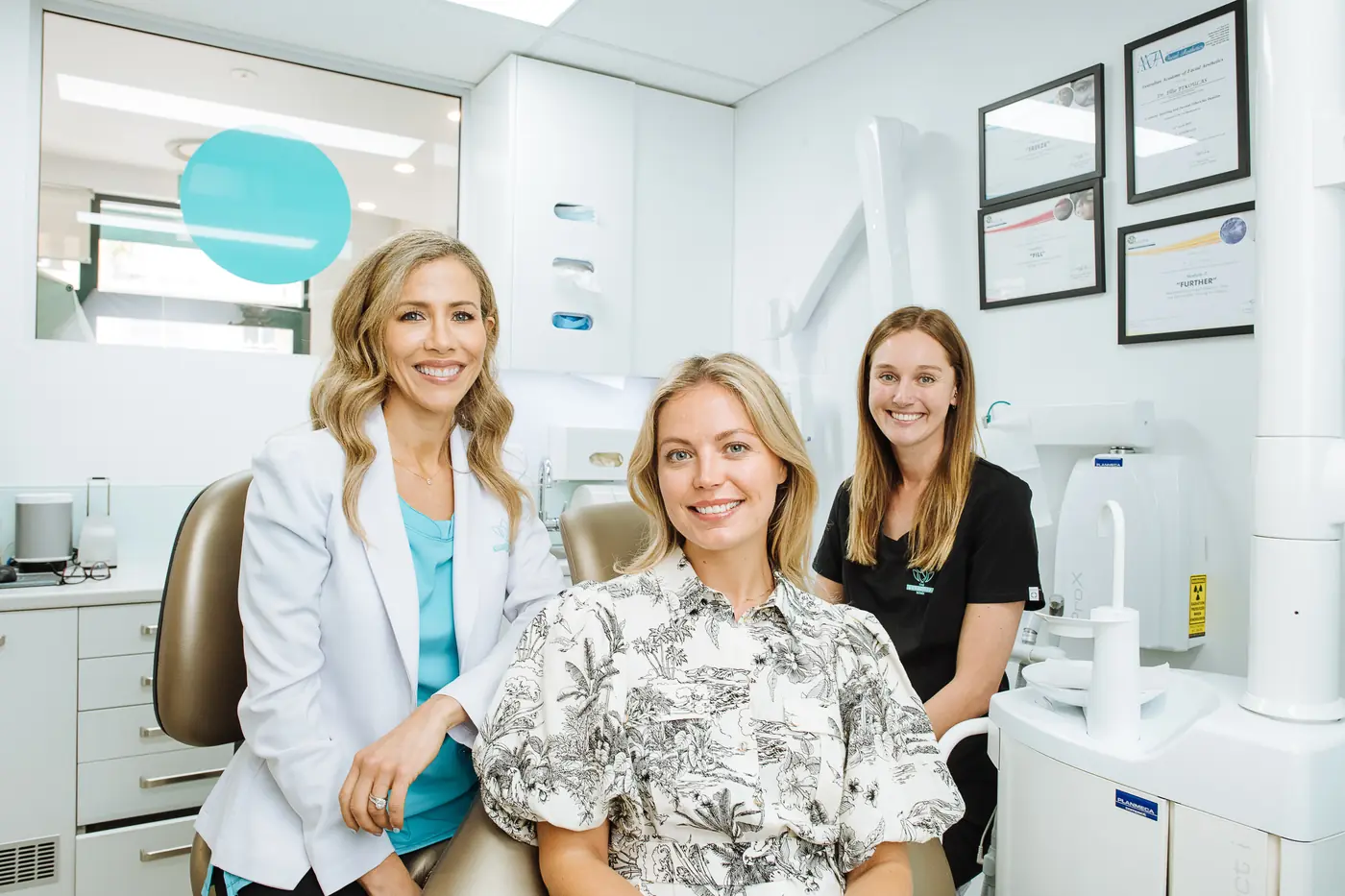 Dr Ellie Montero with a patient and a member of the team